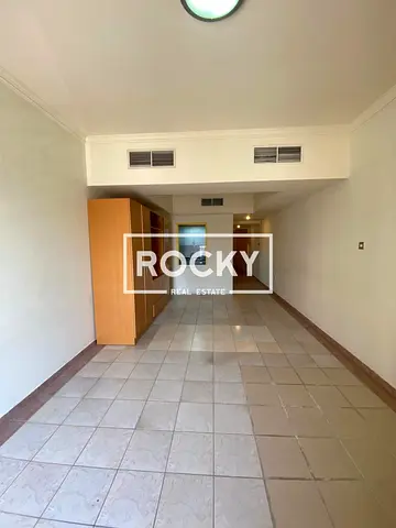 Studio in Karama with balcony | Pool Gym | Behind Ansar Gallery