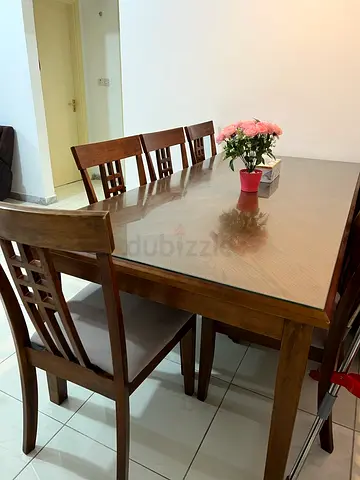 Very good offer due to URGENT SALE: Wooden Dining Table with 6 Chairs