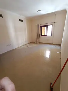 Central AC, free parking, balcony, prime location in Al Khan