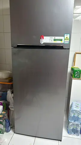 My stainless steel top-freezer fridge (2-door) - good condition