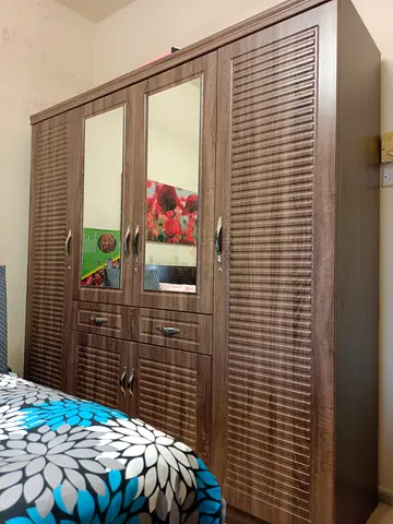 4 door Wooden Wardrobe with MirrorsWith many free stuffs-