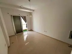 One bedroom and living room, 2 bathrooms, high balcony. 30,000 (currency unspecified) in 4 or 6 inst