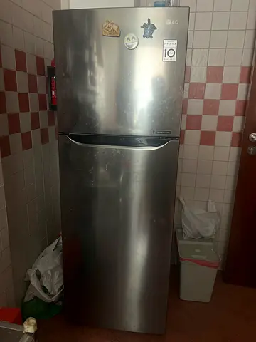 LG stainless steel refrigerator with freezer - used, working