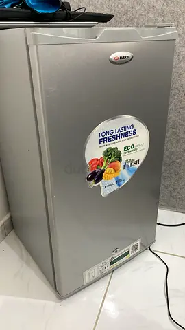 Compact silver mini fridge - single door (working)