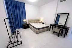 Master room with attached bathroom balcony falcon Ajman