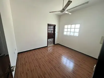 One bedroom and living room apartment in Al Rashidiya, near Ajman Markets Association, on Al Mina Street.