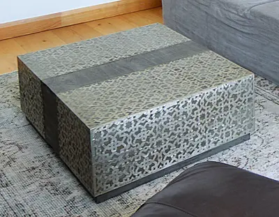 Low square patterned metal coffee table