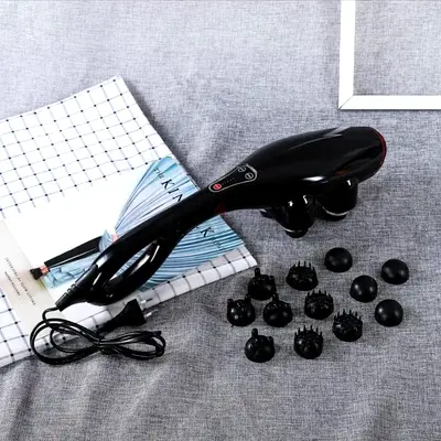 Handheld electric body massager with 12 attachments new not used
