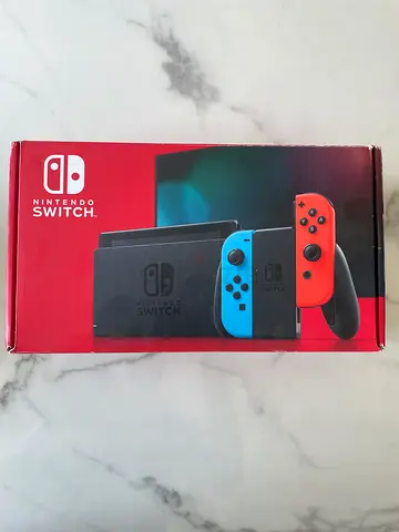 Nintendo Switch with Original Accessories and Pro Controller