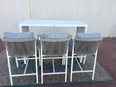 Elegant Outdoor Table  Chairs Set Upgrade your outdoor space with this elegant white table and 3 c