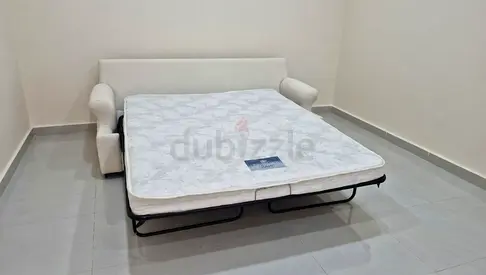Crate Barral two seater sofa bed with mattress