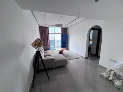 One-bedroom apartment with living room, two bathrooms, Al Nuaimiya 3, Ajman. Central air conditioning. Suitable for families. Spacious. Prime location