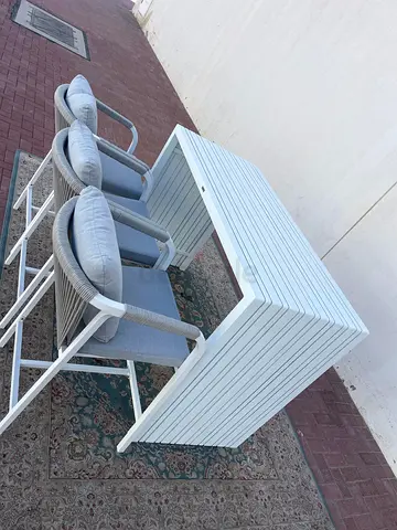 Outdoor Patio Set – White Modern Design Attractive white outdoor furniture set with 3 chairs and a d