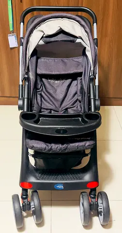 Baby stroller with snack tray  large storage - good condition