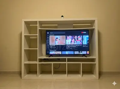 White TV Entertainment Center with Multiple Shelves - Good Condition