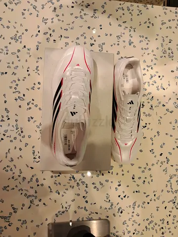 Adidas white soccer cleats (new with tags)