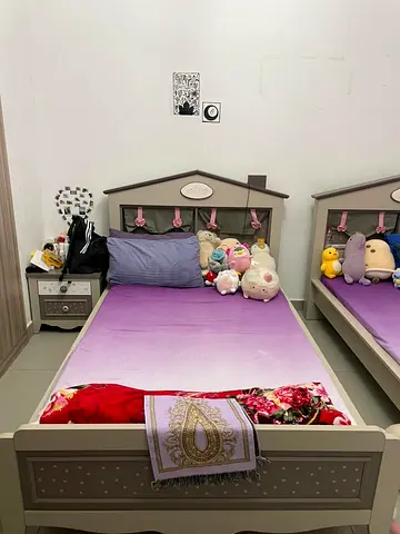 Pair of kids single beds with headboards — good condition with mattresses