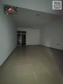 For annual rent in Ajman, a one-bedroom apartment with a living room, balcony, two bathrooms, and st
