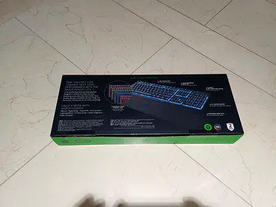 Razer gaming keyboard with arm rest for URGENT SALE keyboard is in perfect condition