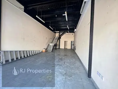 1 month free luxury shop with mezzanine floor with washroom with parking with office space very prime location in industrial 13