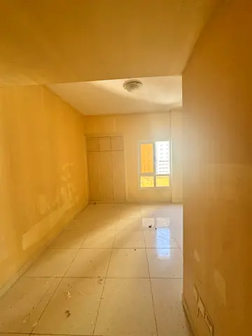 A spacious one-bedroom apartment with a swimming pool and gym in Al Nuaimiya 1, next to Al Hikma School. Excellent location and great price.