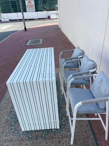 Elegant Outdoor Table  Chairs Set Upgrade your outdoor space with this elegant white table and 3 c