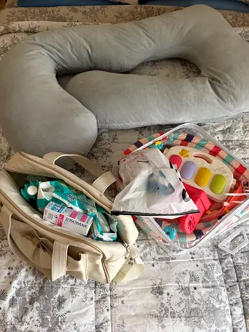 Pregnancy pillow and diaper bag  pumpers bundle