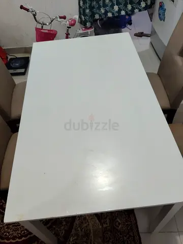 DINING TABLE WITH 4 CHAIRS..