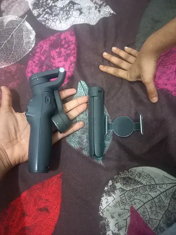 Used handheld smartphone gimbal with detachable phone mount