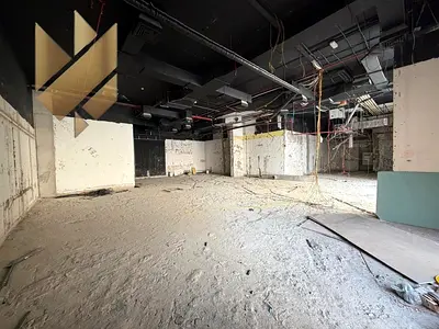 Shop for rent in New Muwailih, large area on a main street.