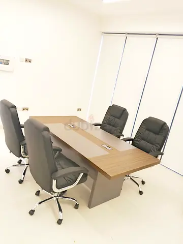 Conference table with 4 swivel office chairs - good condition