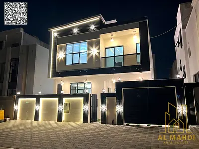 Luxury villa in Al Helio 2, Ajman, ready for immediate occupancy with high-end finishes and spacious living areas. Freehold ownership for all national