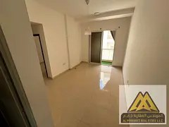 One bedroom and living room for rent in Al Alia, Ajman, with a spacious area, balcony, and a distinc