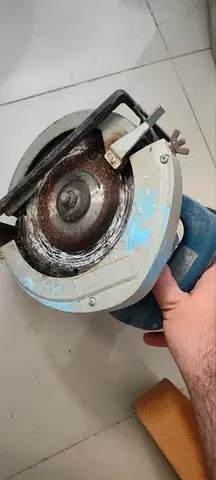 Used handheld circular saw - working, signs of wear