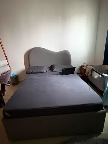 Comfortable Queen Size Bed with Unique Headboard