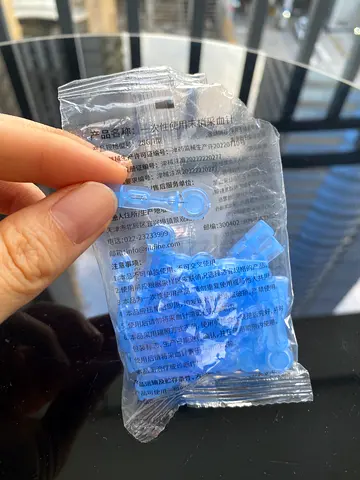 Pink bottle + single-use lancet needles – 10 AED total