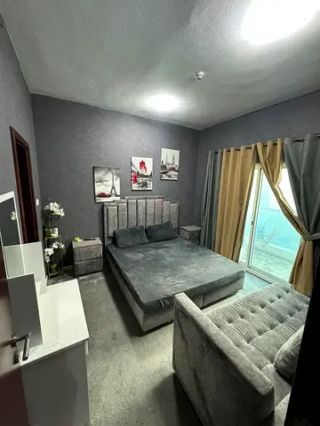 Master bedroom is available for monthly rent in City Towers, Al Nuaimiya 3