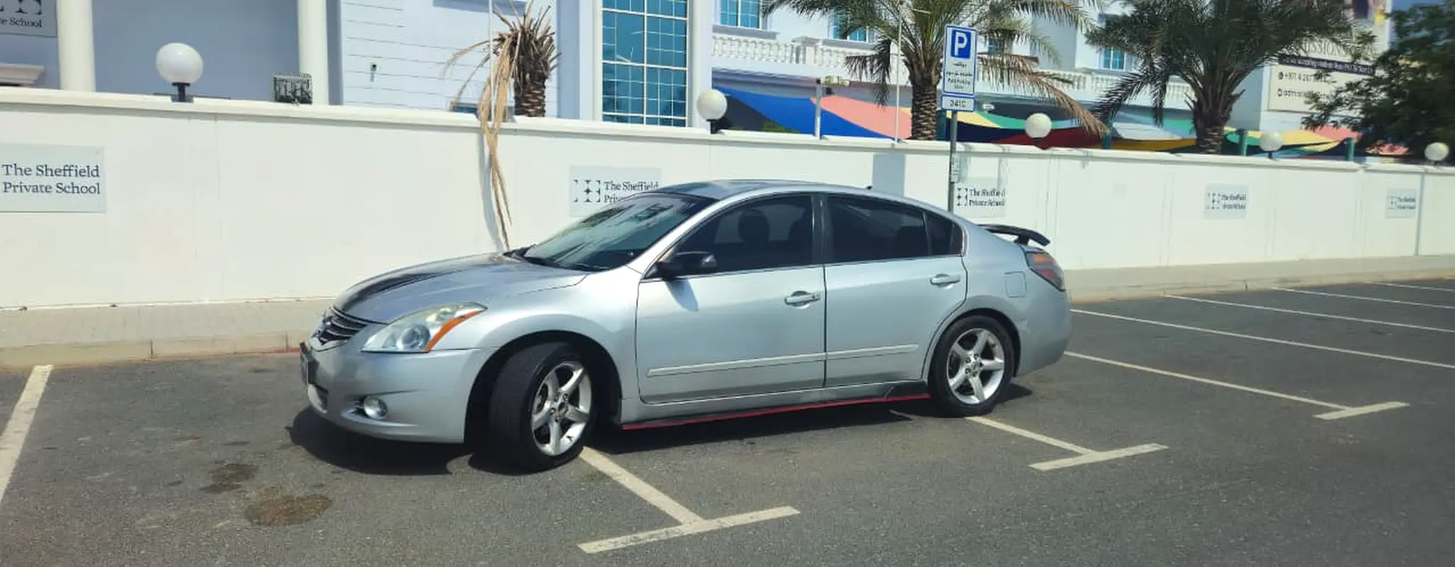 Nissan Altima 2010 — photo 1 of 17