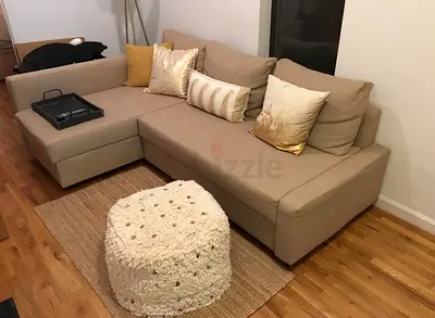 My beige L-shaped sectional sofa with chaise - good condition