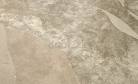 Modern abstract gray-beige area rug - lightly used