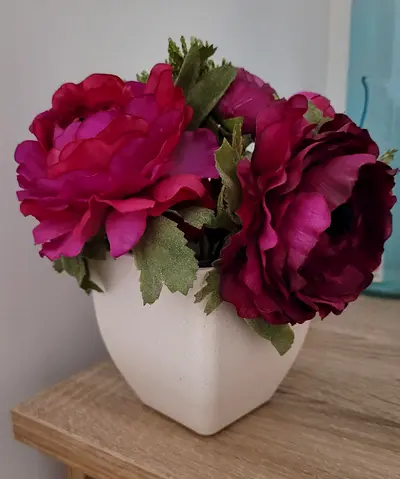 Silk flower arrangement in white ceramic pot - gently used