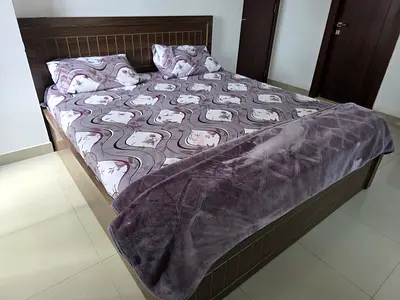 Wooden king bed with medical mattress