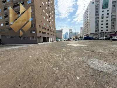 أرض للايجار في النهدة بمساحة باركينات موقع ممتاز على زاوية