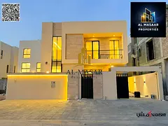 Villa for rent in Al Yasmin, first occupancy, directly behind the park, hotel-style finishing, ready