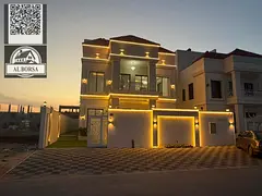 Villa for sale in Al Helio 2, Ajman. 5 bedrooms, majlis, living room, maid's room, and spacious 