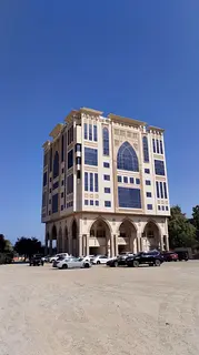 Building for sale in Khor Fakkan, prime location, area 9370 sq ft