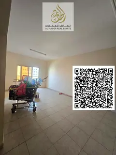 Three-bedroom apartment with a living room, three bathrooms, and a balcony in Al Nuaimiya 1. Prime l