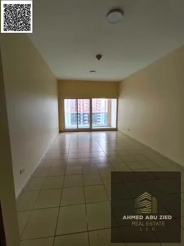 One bedroom and living room with 2 bathrooms, free parking, and a garden inside the tower with a gym, swimming pool, kids' area, and a very spacious