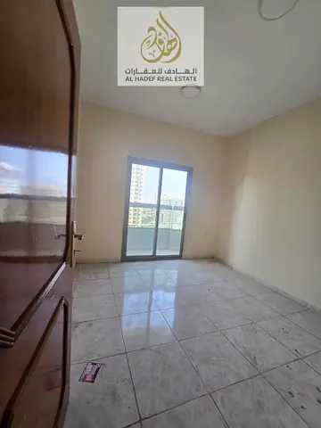 🏡✨ شقة غرفتين وصالة للإيجار السنوي في النعيمية 1 – موقع مميز قريب من مدرسة الحكمة وشارع الكويت وجسر غلفا، تكييف مركزي وبلكونة