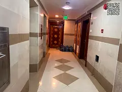 Luxury Two Bedroom Apartment with Spacious Living Room Two Bathrooms Balcony and Central AC in a Pri